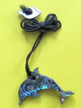 Dolphin necklace on cord